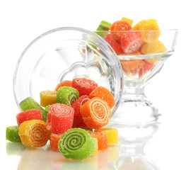 colorful jelly candies in glass bowl isolated on white.