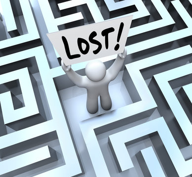 Lost Man Holding Sign in Labyrinth Maze