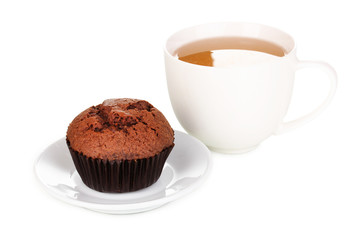 Fresh muffin with tea isolated on white