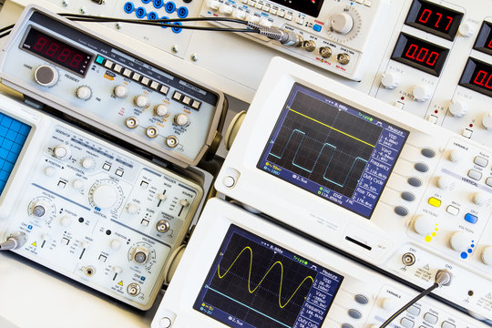 two digital oscilloscopes for measuring table