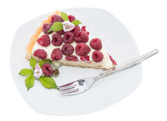 Raspberry Tart on plate against white