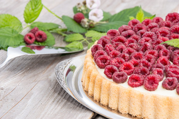 Raspberry Tart against wood