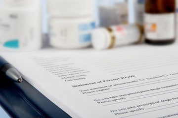 Medical Questionnaire and medicine bottles