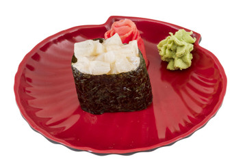 spice sushi hotate with sauced slices of scallop isolated on whi