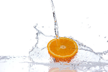  Orange slice in water splash, isolated on white background