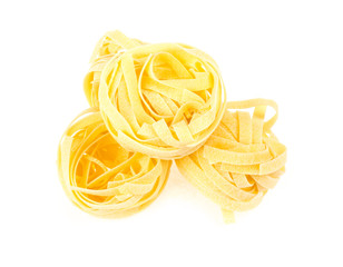 Italian pasta fettuccine nest isolated on white background