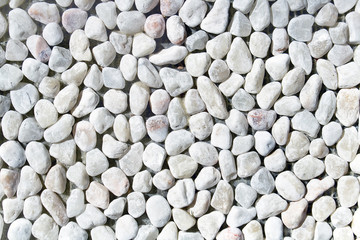 White pebble stones as background