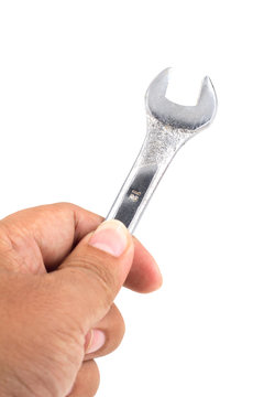Wrench with hand isolated on white background