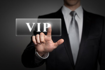 businessman pressing virtual button - VIP - obrazy, fototapety, plakaty
