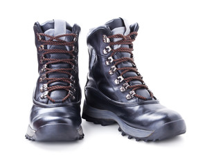 A pair of black boots isolated on white