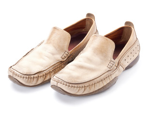 Pair of brown male loafers isolated on white
