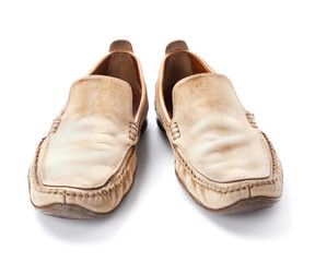 Pair of brown male loafers isolated on white