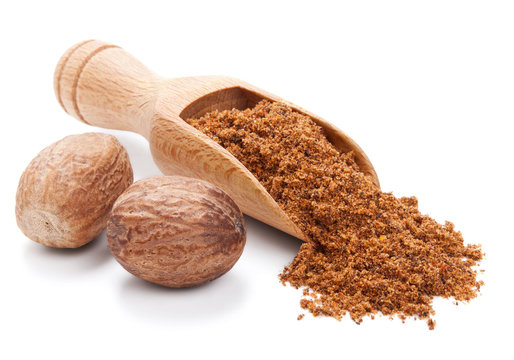 Fototapeta milled nutmeg isolated on white