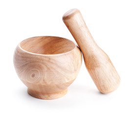 wooden mortar and pestle set isolated on white