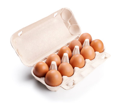 brown eggs in a carton package isolated on white