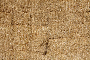 Stacked hay bales background