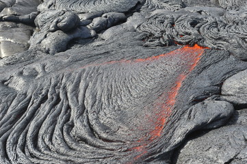 Flowing lava from Kilauea volcano, Hawaii. April, 2012.