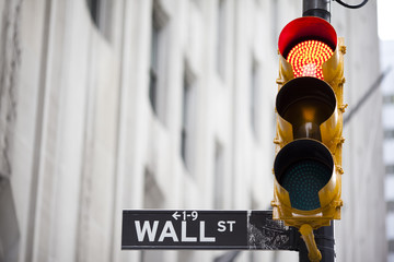 Wall street and red traffic  light
