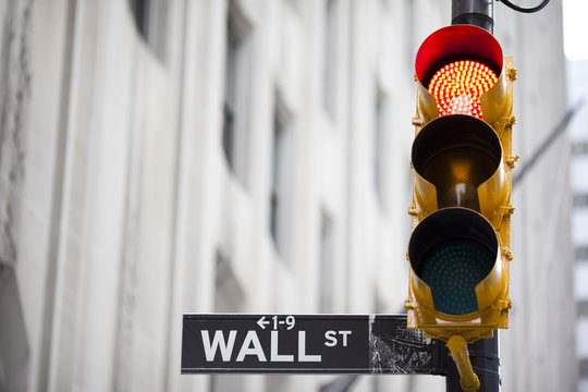 Wall Street And Red Traffic  Light