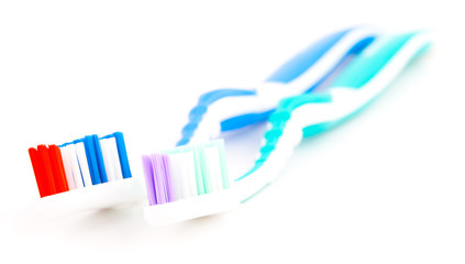 Two toothbrushes.