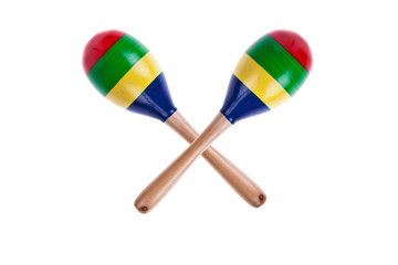 Obraz premium pair of colorful wooden maracas isolated on white background