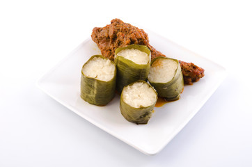 Traditional malay cuisine of sticky rice and spicy beef with pea
