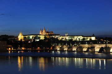 Fototapeta na wymiar The Prague Castle and the Charles Bridge at dusk in Prague, Czec