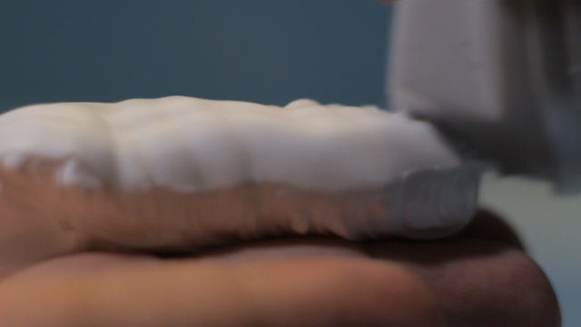 shaving cream hand close up