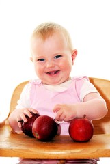 Fototapeta premium happy little girl with apples