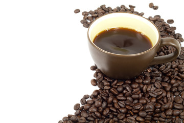 cup of hot coffee and coffee beans in white background