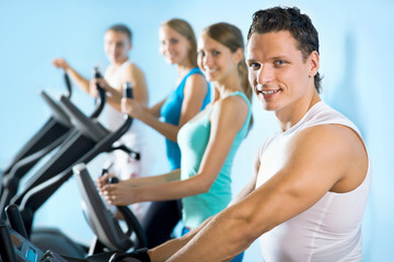 Fototapeta na wymiar People on the treadmill. Fitness