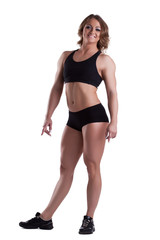 Strong woman full height body builder isolated