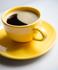.Coffee in an yellow cup