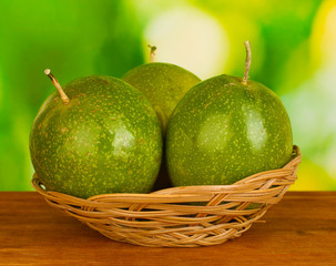 green passion fruit on green background