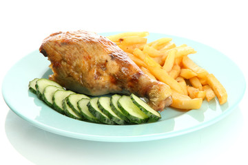 Roast chicken with french fries and cucumbers