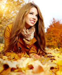 autumn woman on leafs