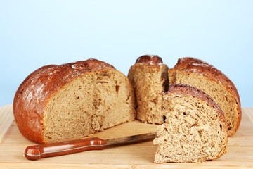 sliced bread on blue background close-up