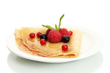 Delicious pancake with berries and honey