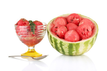 A glass of watermelon ice cream and half watermelon isolated