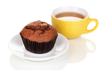 Fresh muffin with tea isolated on white