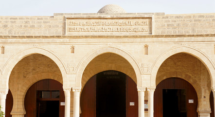 The ocher facade of the great mosque of Sousse in Tunisia