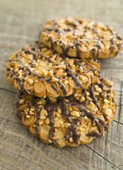 chocolate chip cookies on wooden table (selective focus)