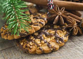 Christmas cakes on brown wooden background (selective focus)