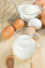 Basic ingredients for dough. Milk, eggs and flour.
