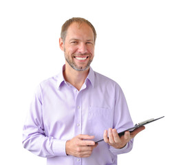 Smiling man with a tablet isolated on white background