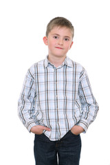 Satisfied boy keeps hands in pockets