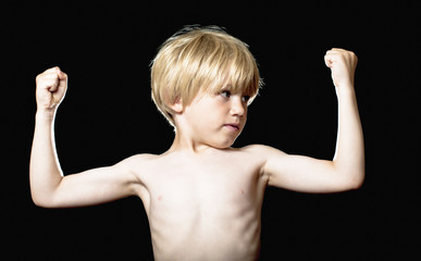 Little boy showing muscles © fasphotographic