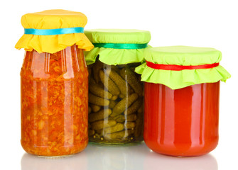 Jar with canned cucumbers, lecho and tomato paste isolated