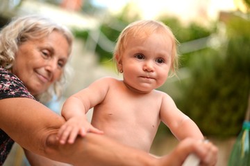 grandmother with baby