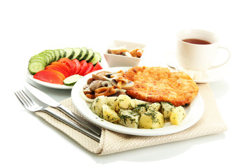 Roast chicken cutlet with boiled potatoes and mushrooms, cup of